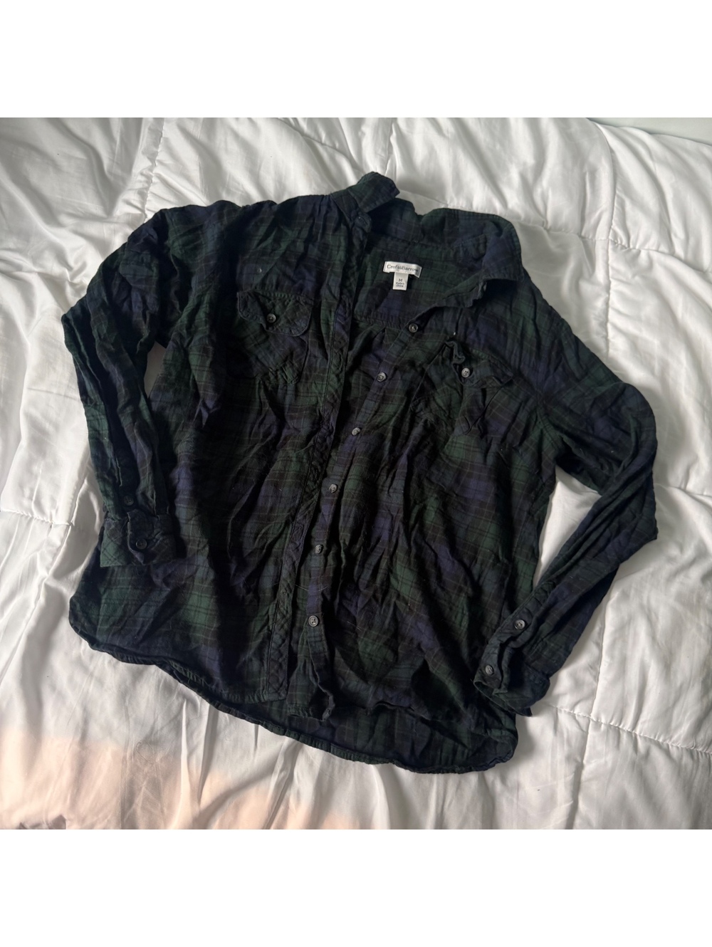 green and navy blue flannel medium